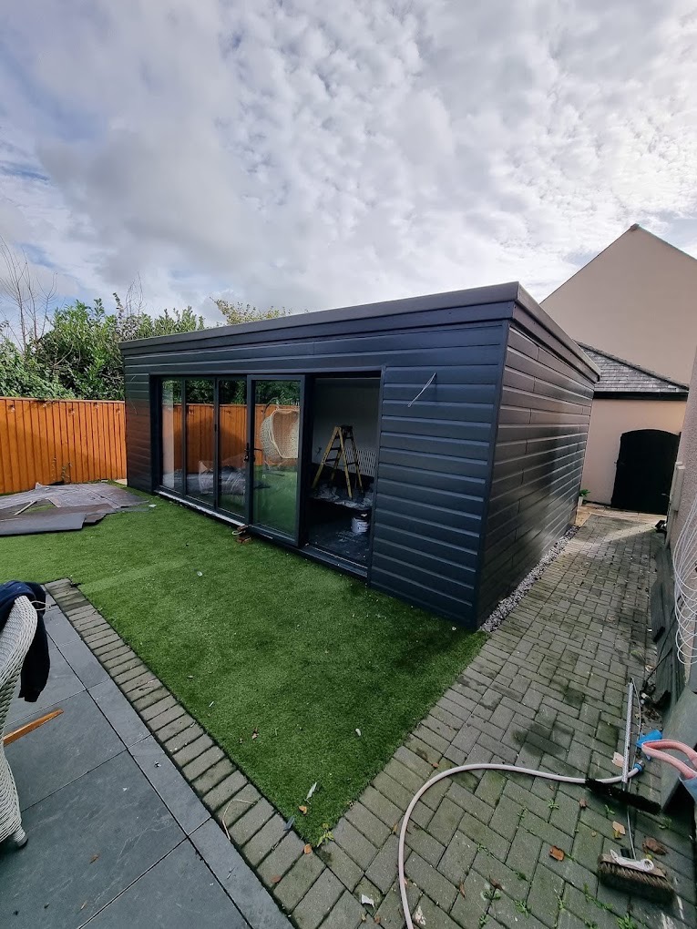 Composite-clad garden room with bifold doors