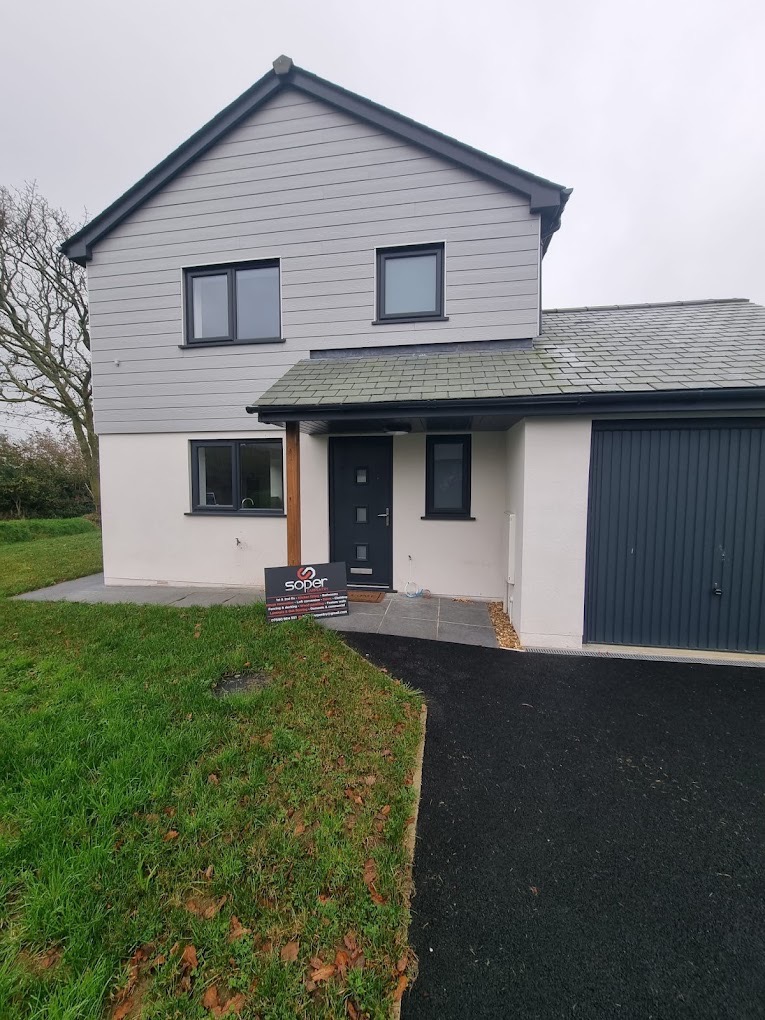 House exterior finished with grey cladding